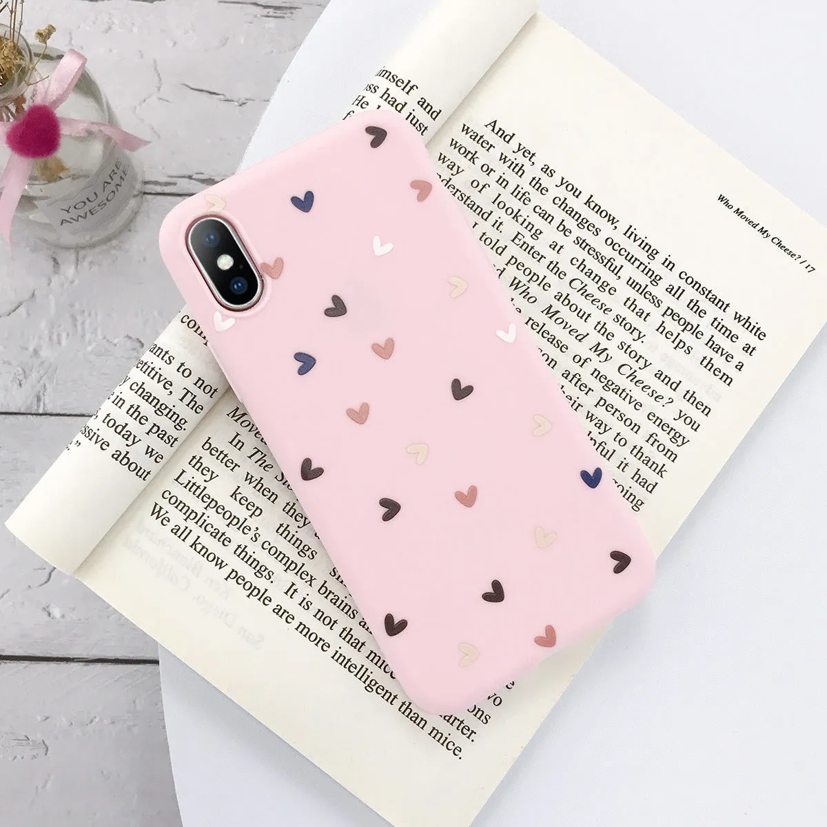 Transparent iPhone case with small flower and wave dot pattern in multiple colour options