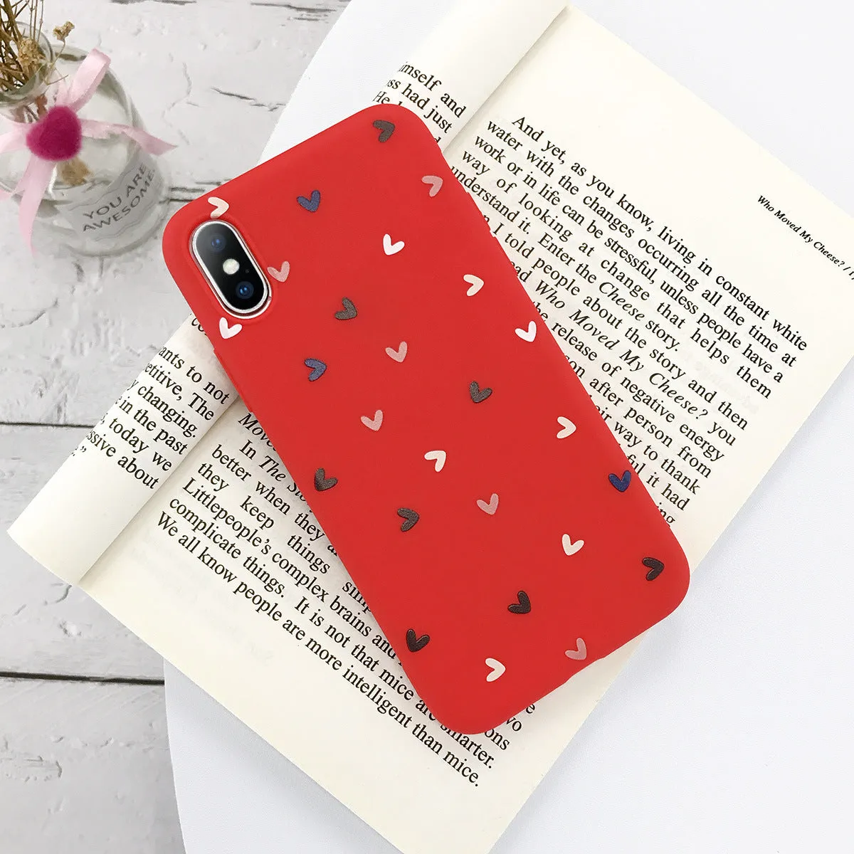 Transparent iPhone case with small flower and wave dot pattern in multiple colour options