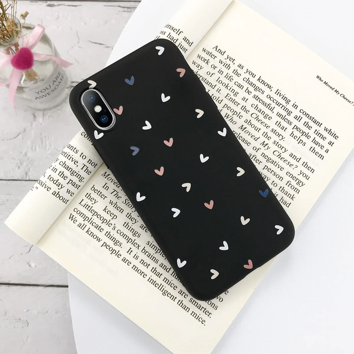 Transparent iPhone case with small flower and wave dot pattern in multiple colour options