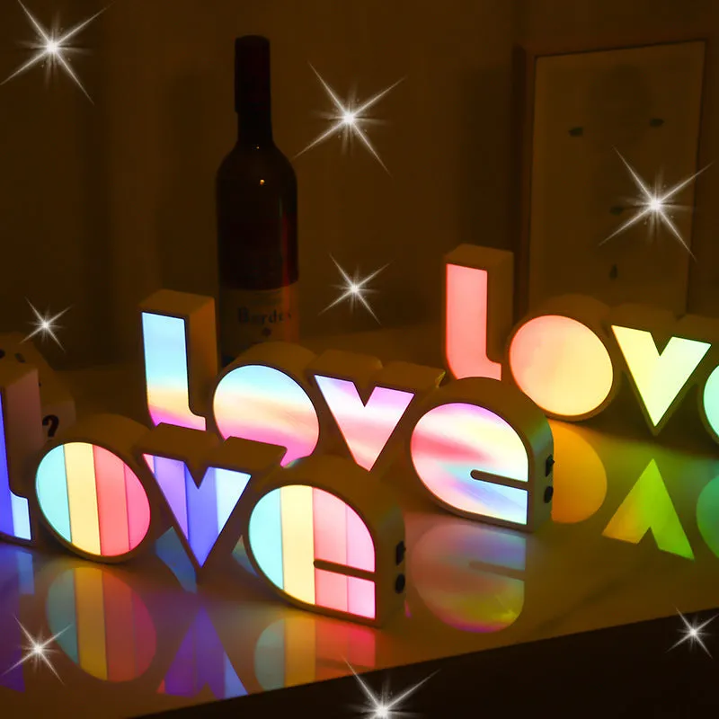 Colourful LED LOVE word light with rainbow halo lampshade for romantic decoration.