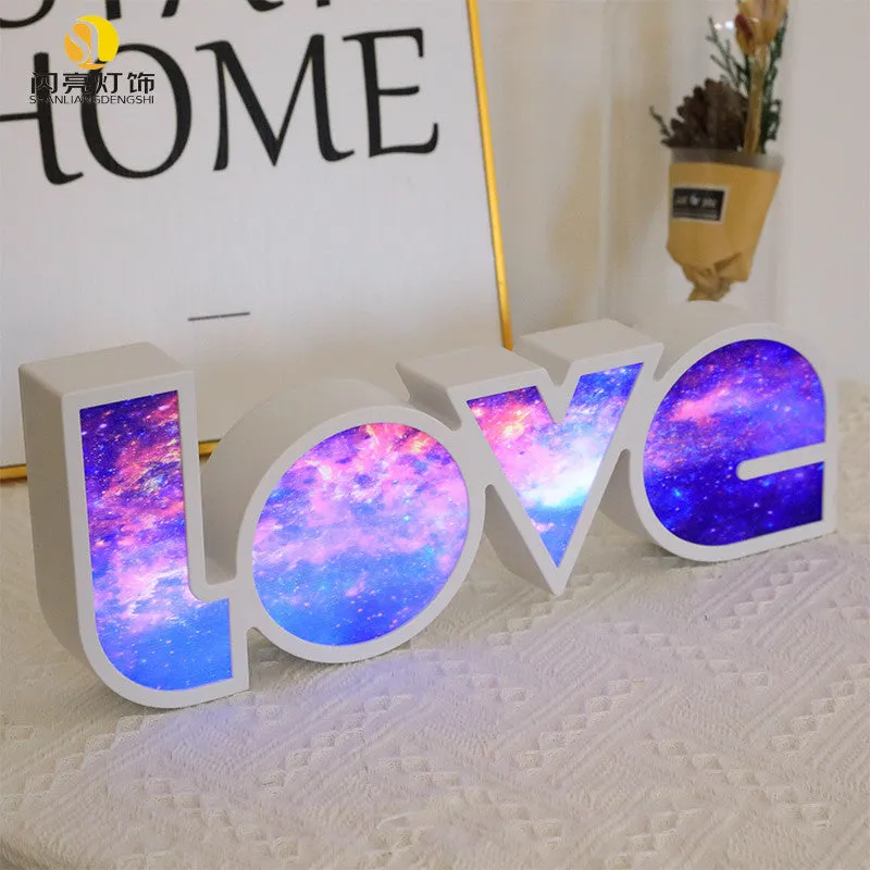 Colourful LED LOVE word light with rainbow halo lampshade for romantic decoration.