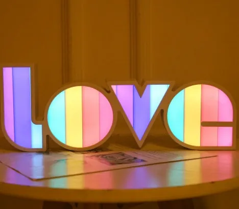 Colourful LED LOVE word light with rainbow halo lampshade for romantic decoration.
