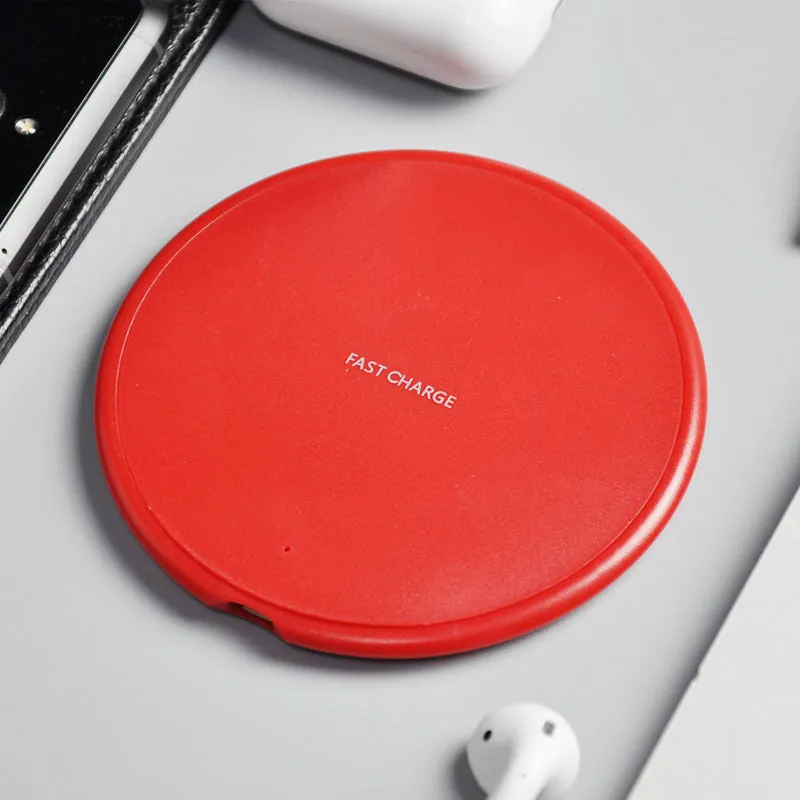 10W round wireless charger KD-20 second generation in black on a white background with QI symbol visible