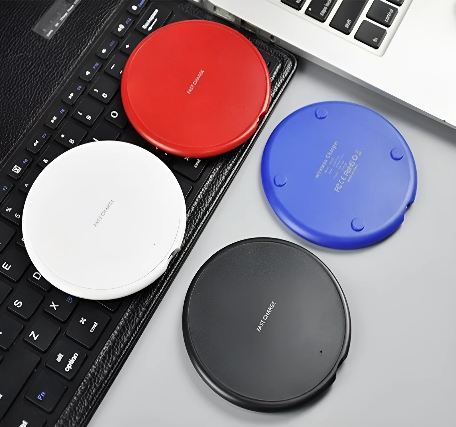 10W round wireless charger KD-20 second generation in black on a white background with QI symbol visible
