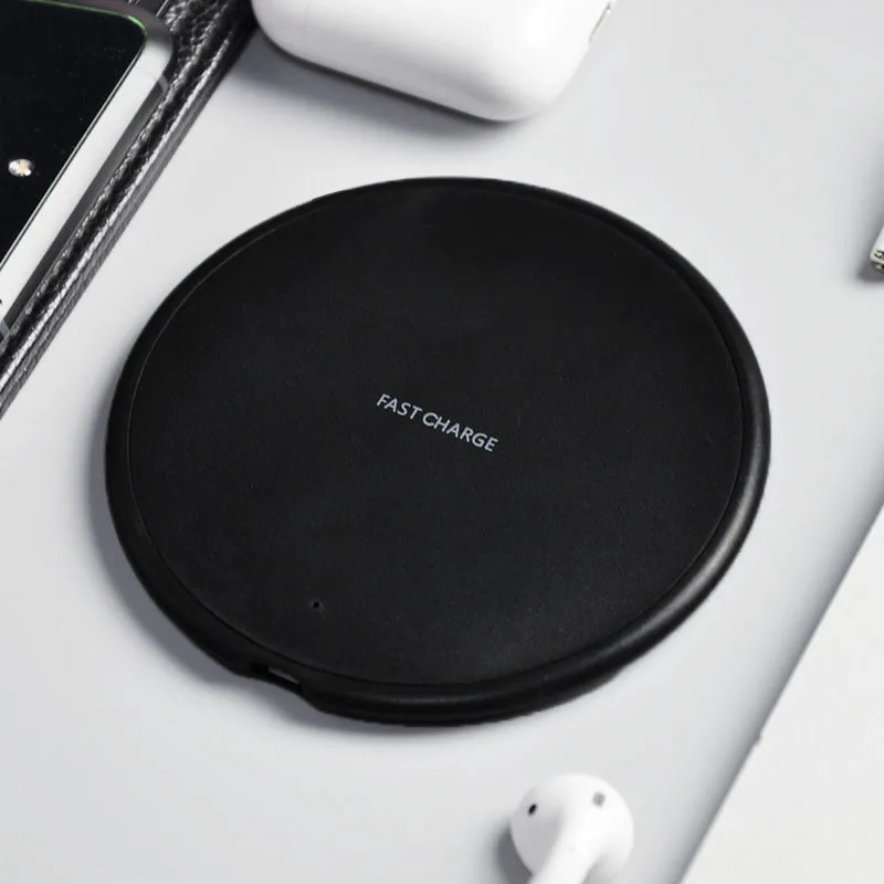 10W round wireless charger KD-20 second generation in black on a white background with QI symbol visible