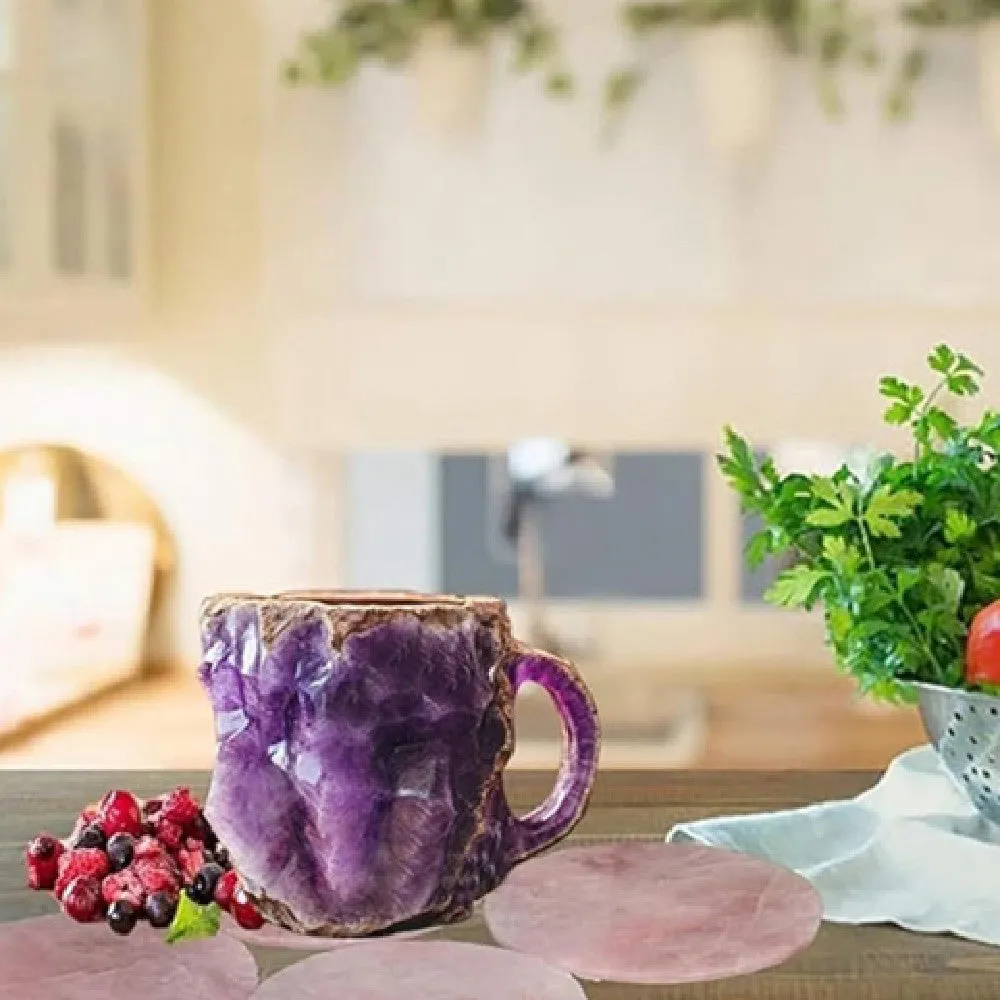 A purple resin coffee mug with a handle, showing a crystal-like structure, on a table.