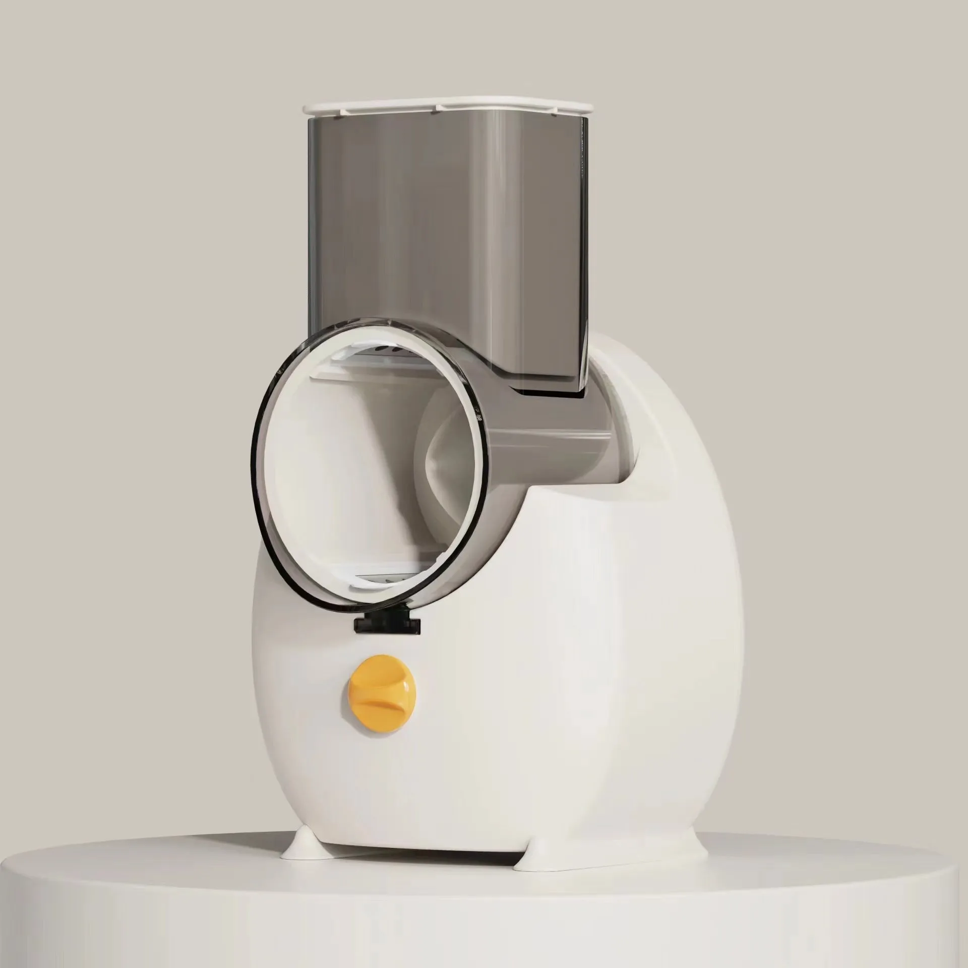 White electric vegetable slicer with rotary grater and suction base on a kitchen counter.