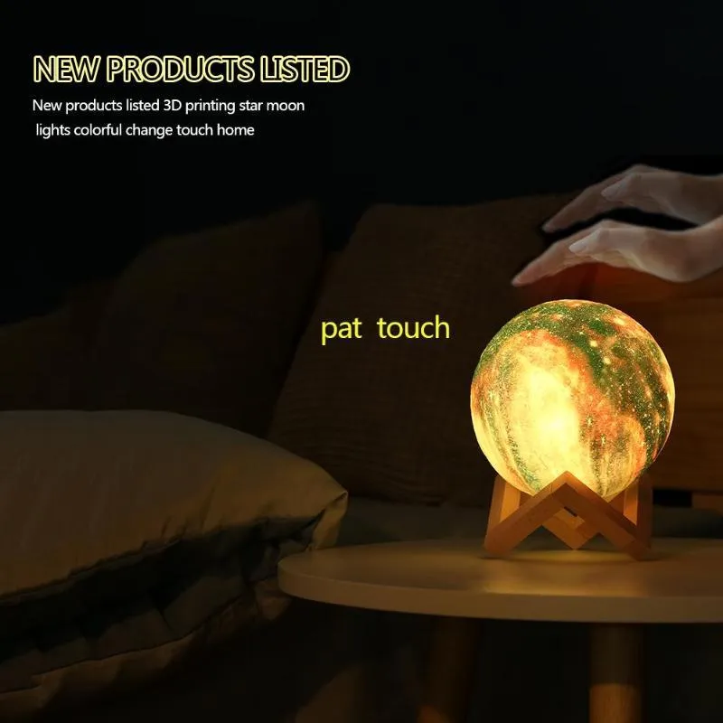 3D-printed white lunar sphere LED night light on a dark surface, showing touch and remote control.