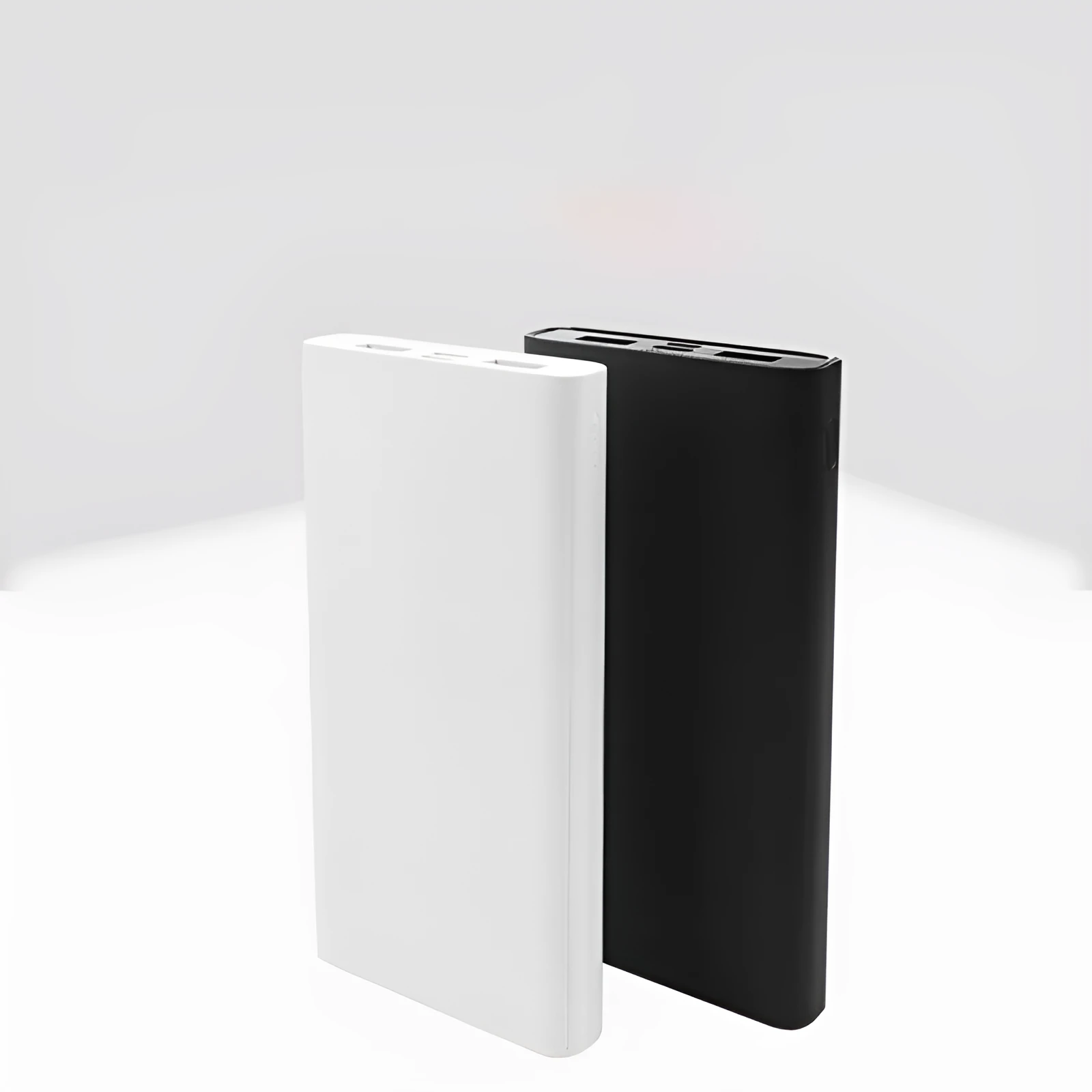 Graphene heating clothing power bank with plastic shell and USB cable on white background