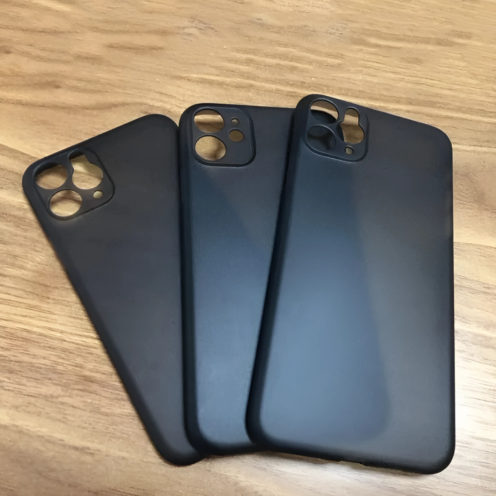 Ultra-thin frosted PP solid colour iPhone case in black with matte finish and precise cutouts