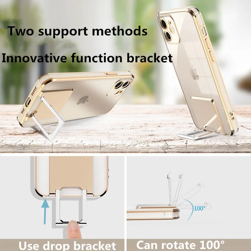 Transparent TPU phone case with gold electroplated bracket, displayed on a grey surface, for iPhone 12 Pro Max