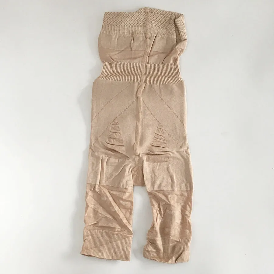Black high-waisted seamless shapewear shorts for women on a hanger.