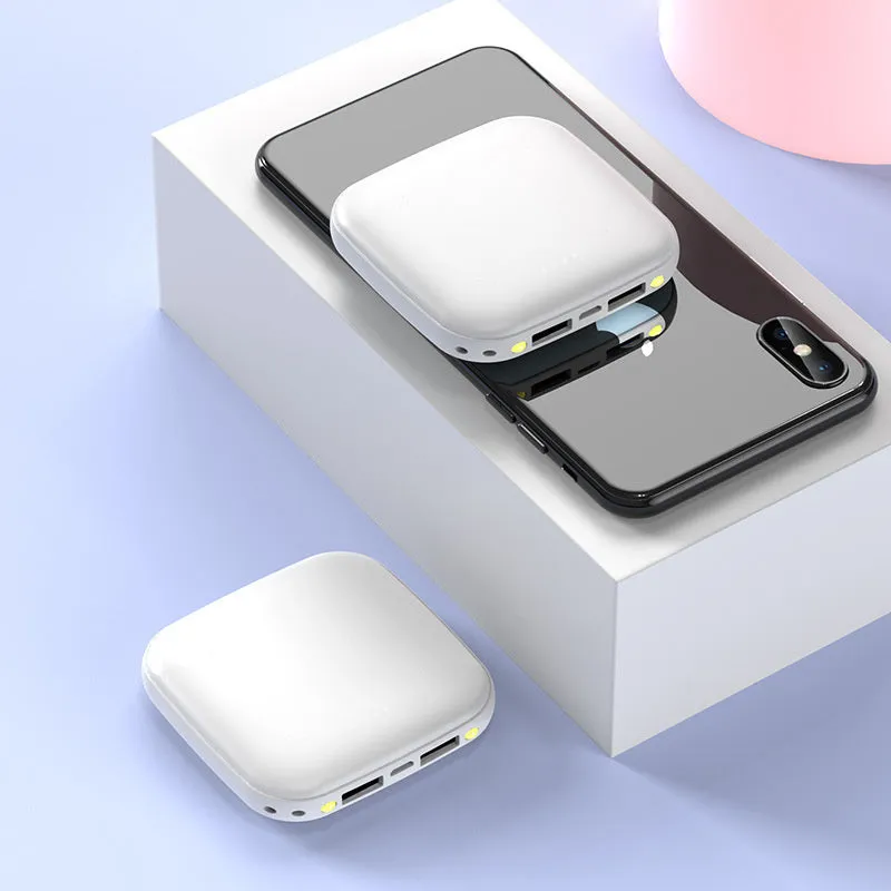 Portable 10000mAh power bank in black with multi-U port output and compact rectangular ABS shell design