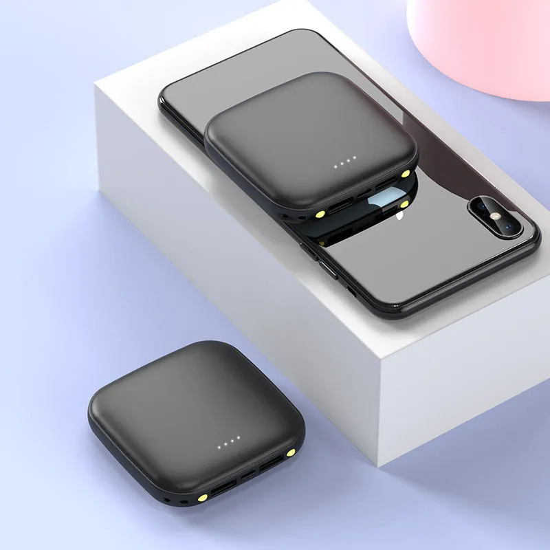 Portable 10000mAh power bank in black with multi-U port output and compact rectangular ABS shell design