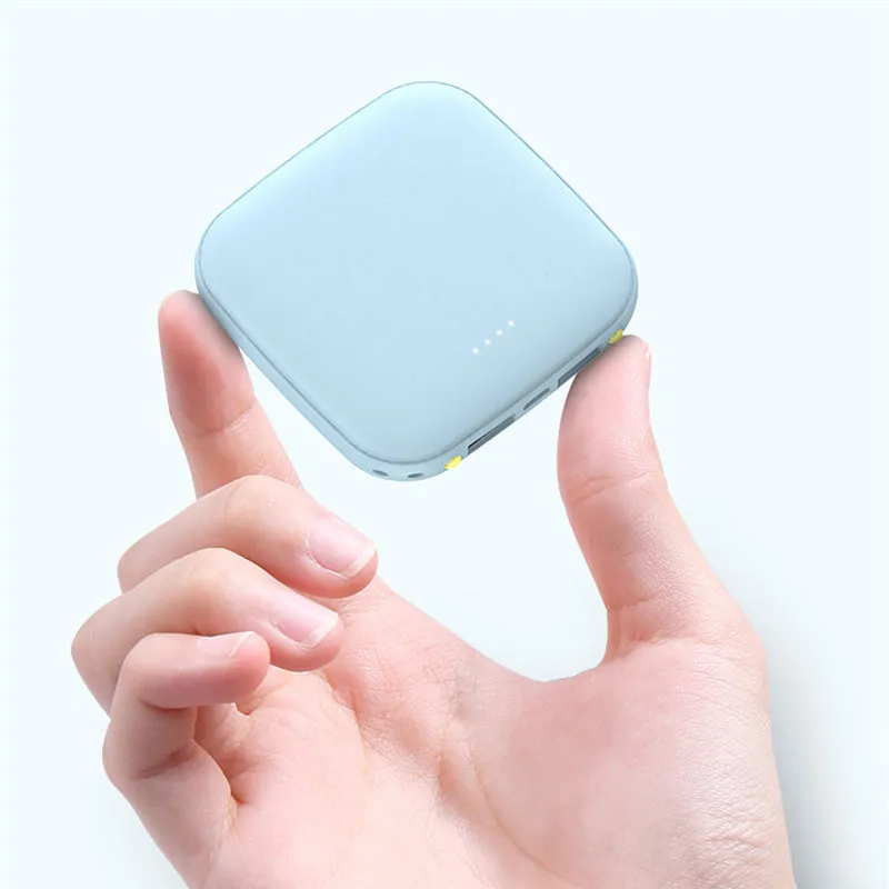 Portable 10000mAh power bank in black with multi-U port output and compact rectangular ABS shell design