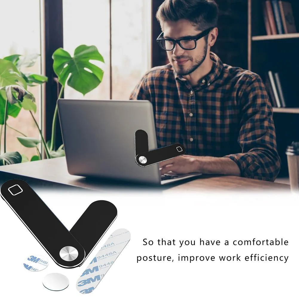 Black aluminium laptop phone holder with magnetic clip attached to laptop edge holding a smartphone