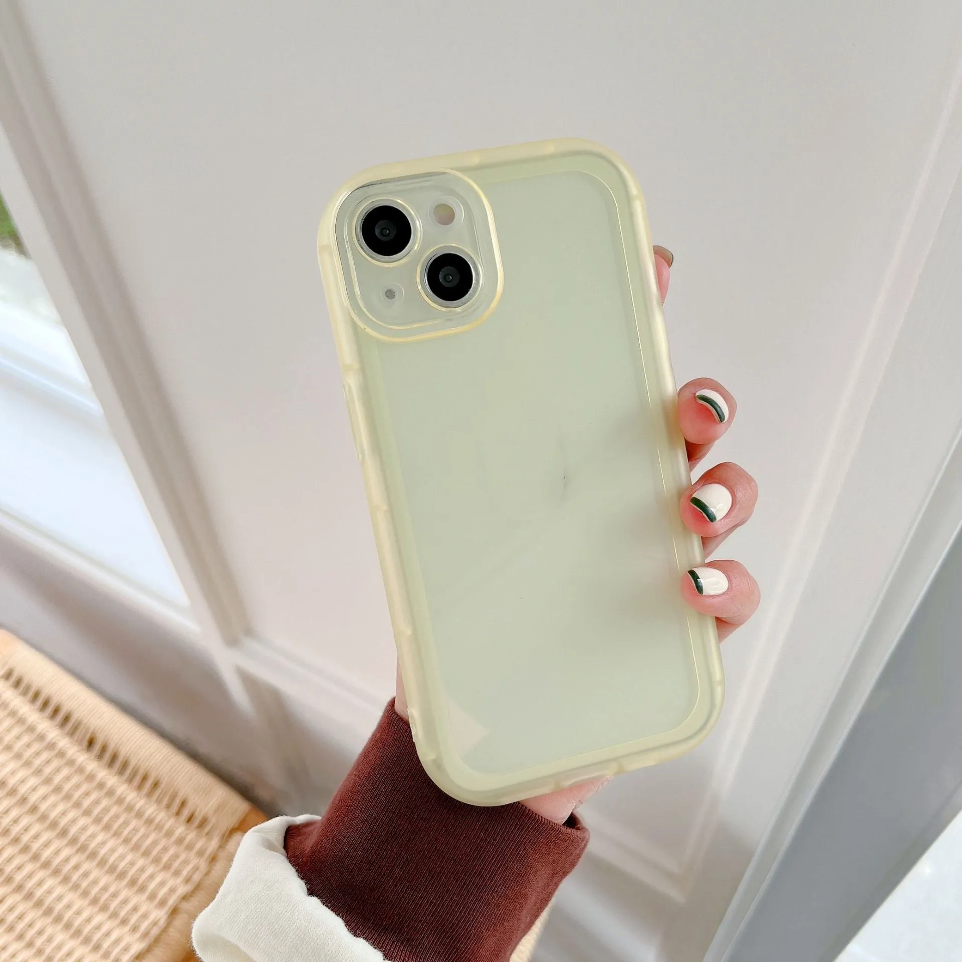 Transparent TPU candy case for iPhone 13 back cover in blue showing solid colour slim fit design