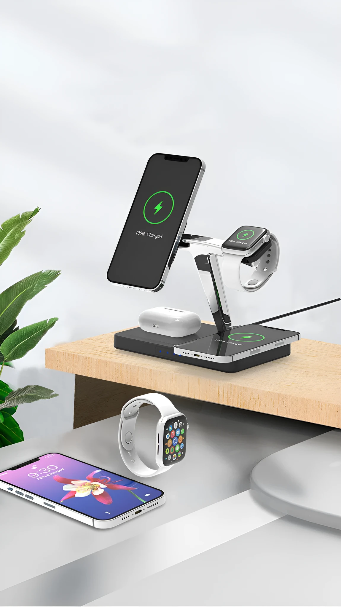 Four-in-one magnetic wireless charger in black with Type-C interface, showing indication function light on charging surface.