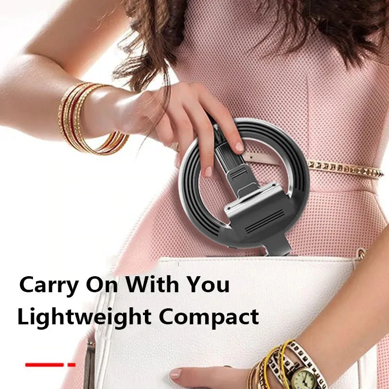 Black aluminium alloy selfie stick tripod with 5-inch ring fill light holding a smartphone, extended to show pole height