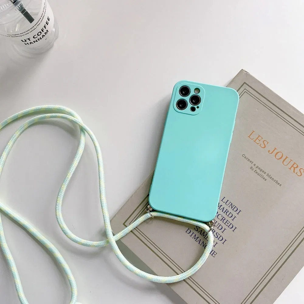 Liquid silicone phone case with crossbody lanyard for iPhone 13 Pro in black, showing rear cover and attached strap