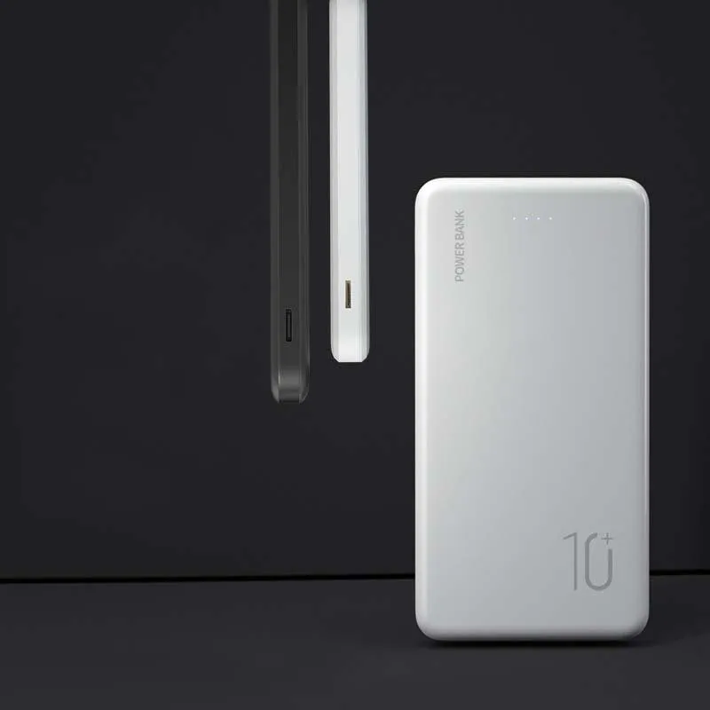 Ultra-thin 10000mAh power bank in black with multi-U port output on a white background