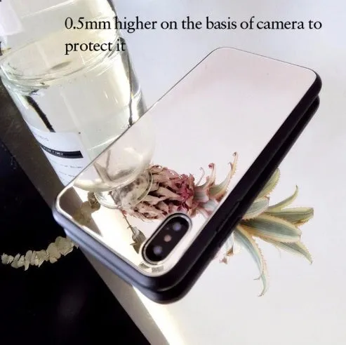Black phone case for iPhone with a reflective mirror surface on the back.