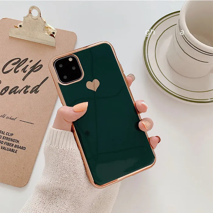 Luxury plating love solid colour TPU back cover case for iPhone on a table.