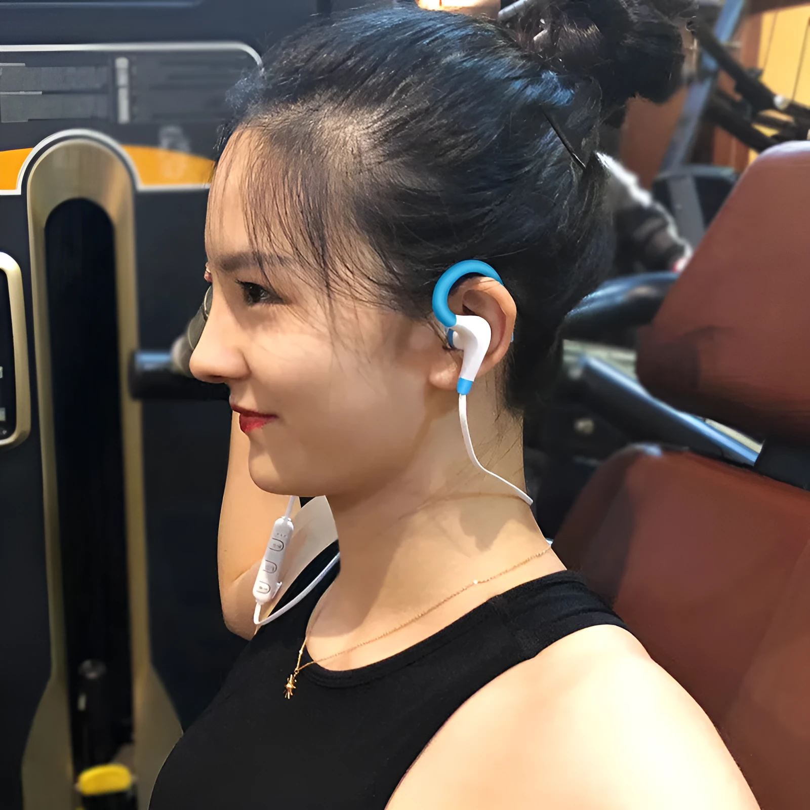 Bluetooth earphone 5.0 wireless stereo earbuds in black, red, and white with charging cable