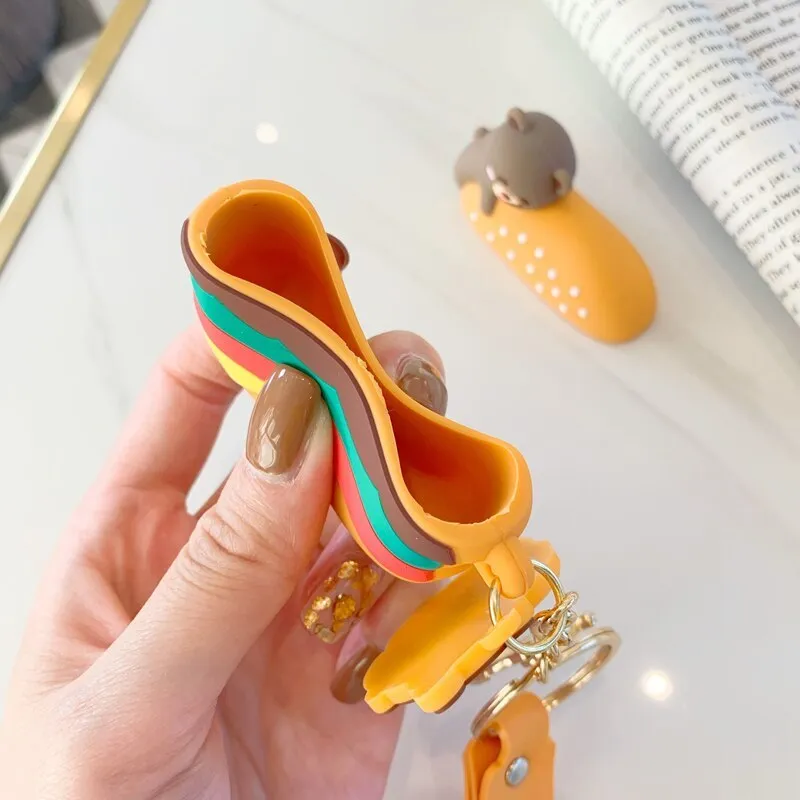 Cartoon silicone protective case for AirPods showing full-body cover with colourful design.