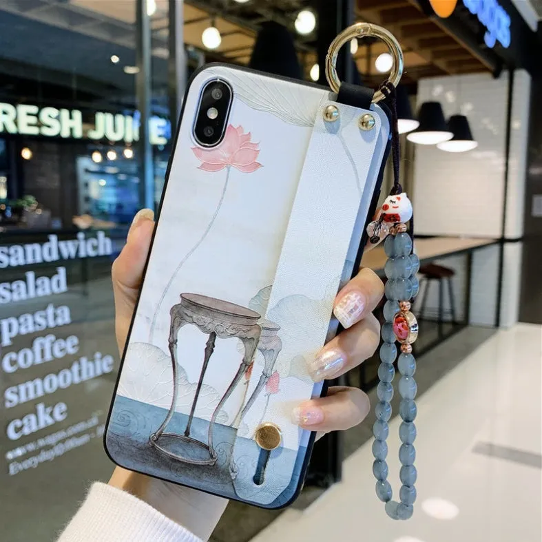 Compatible iPhone case with a detachable rose flower wrist strap, shown in one of ten available styles.