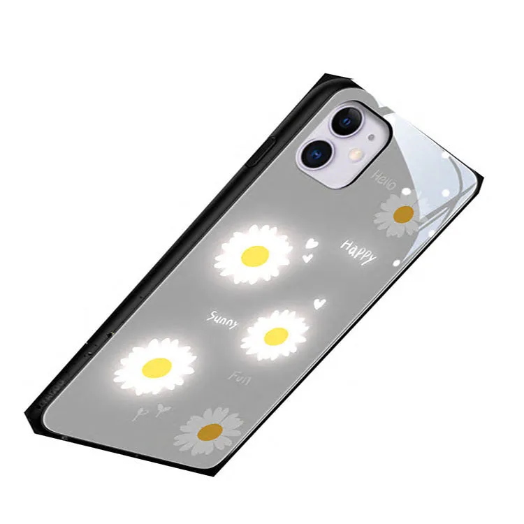 White TPU iPhone case with painted purple daisies and letters, showing voice-activated colour light feature.