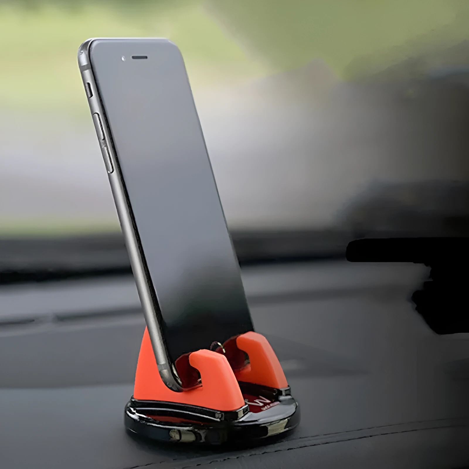 Mini dashboard car cell phone holder with silicone grip and 360-degree rotation in black