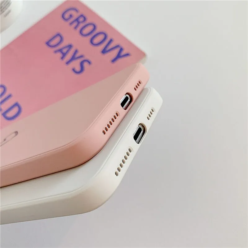 Silicone TPU phone case for Apple iPhone in solid colours black, green, pink, purple, red, white, grey, and light green.