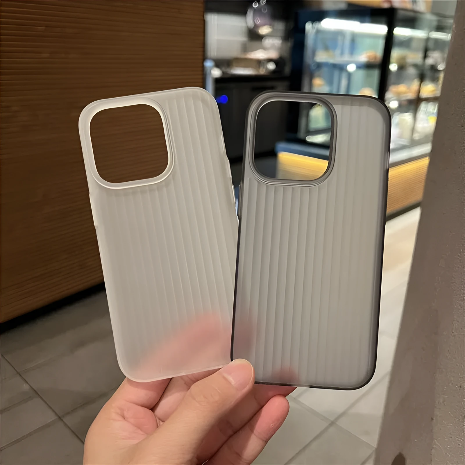 Semi-transparent frosted corrugated silicone phone case in black wave grain pattern for iPhone
