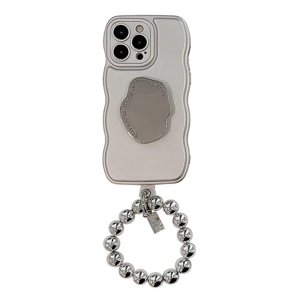 Silver metal bracket phone case for iPhone with electroplated finish and hand bead detail on gray background