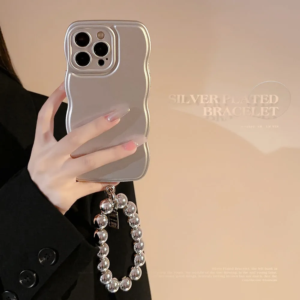 Silver metal bracket phone case for iPhone with electroplated finish and hand bead detail on gray background