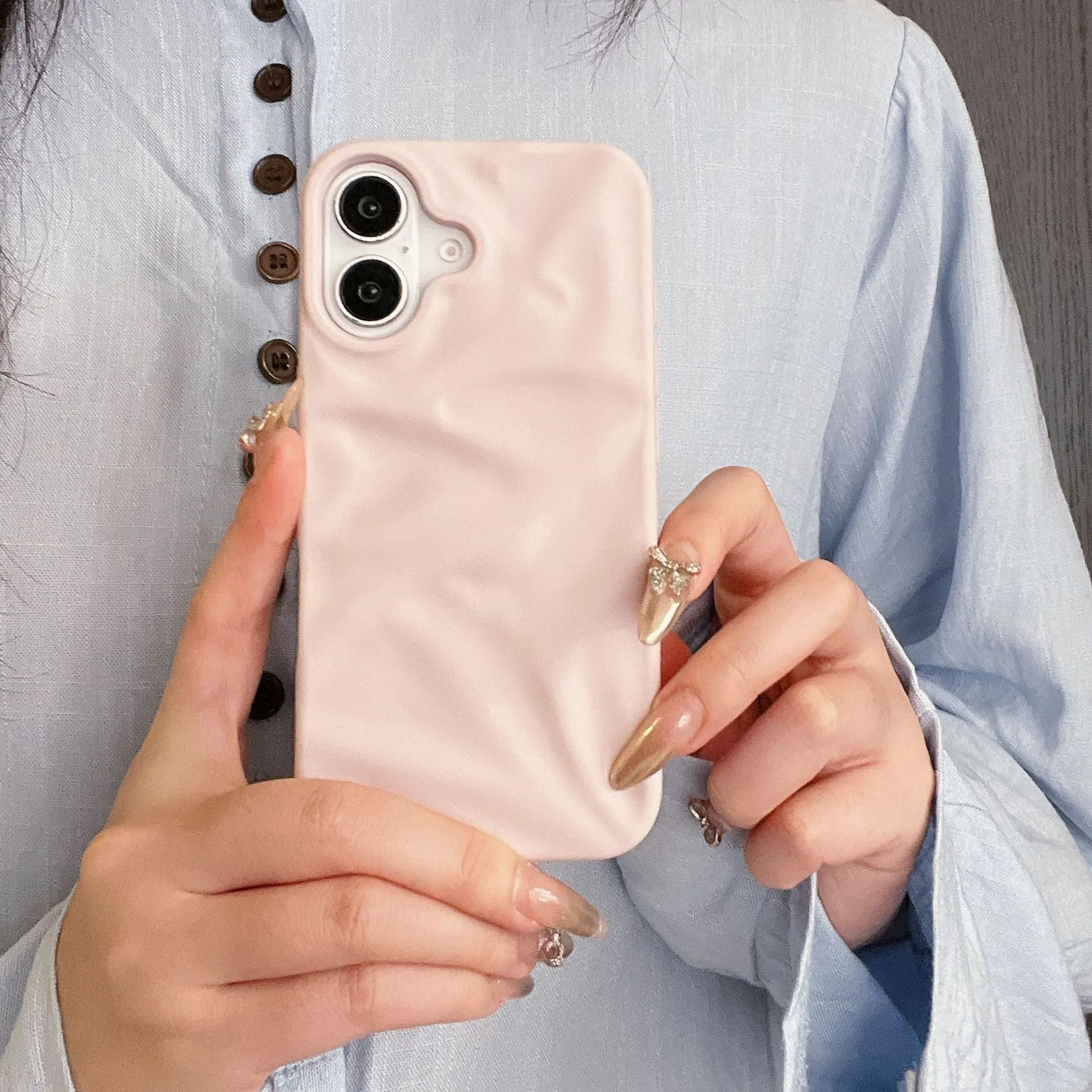 High-grade three-dimensional pleated pattern silicone phone case for iPhone 17 series in black, soft shell construction with fall protection