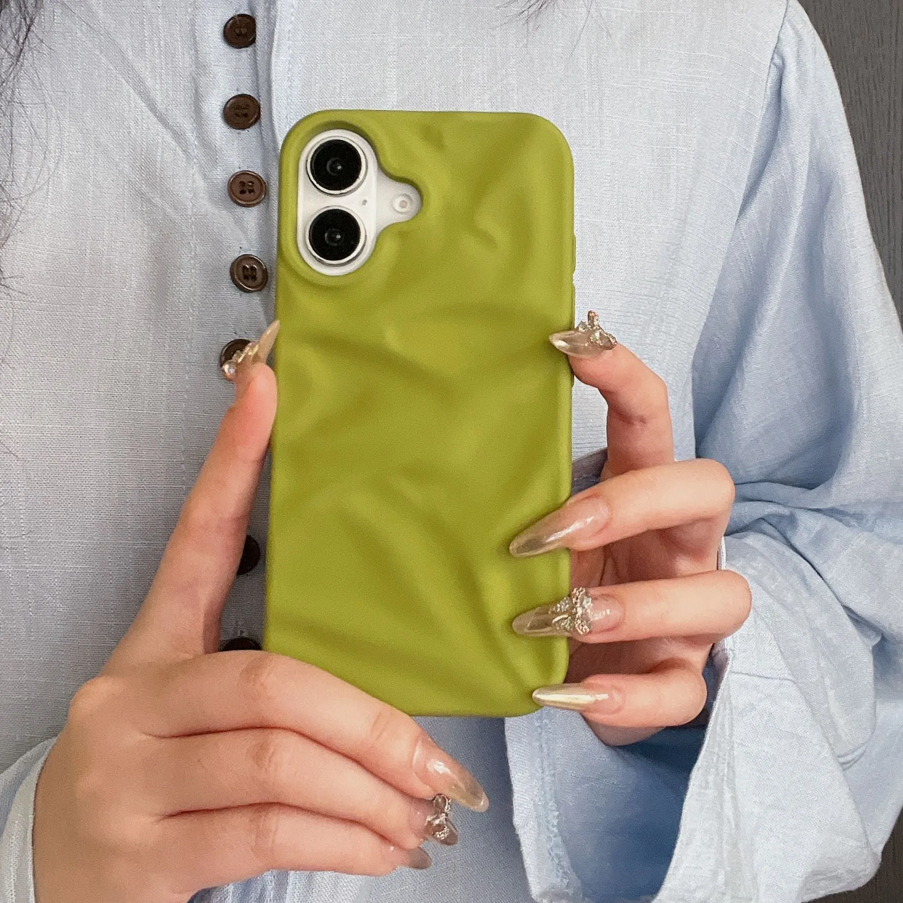 High-grade three-dimensional pleated pattern silicone phone case for iPhone 17 series in black, soft shell construction with fall protection