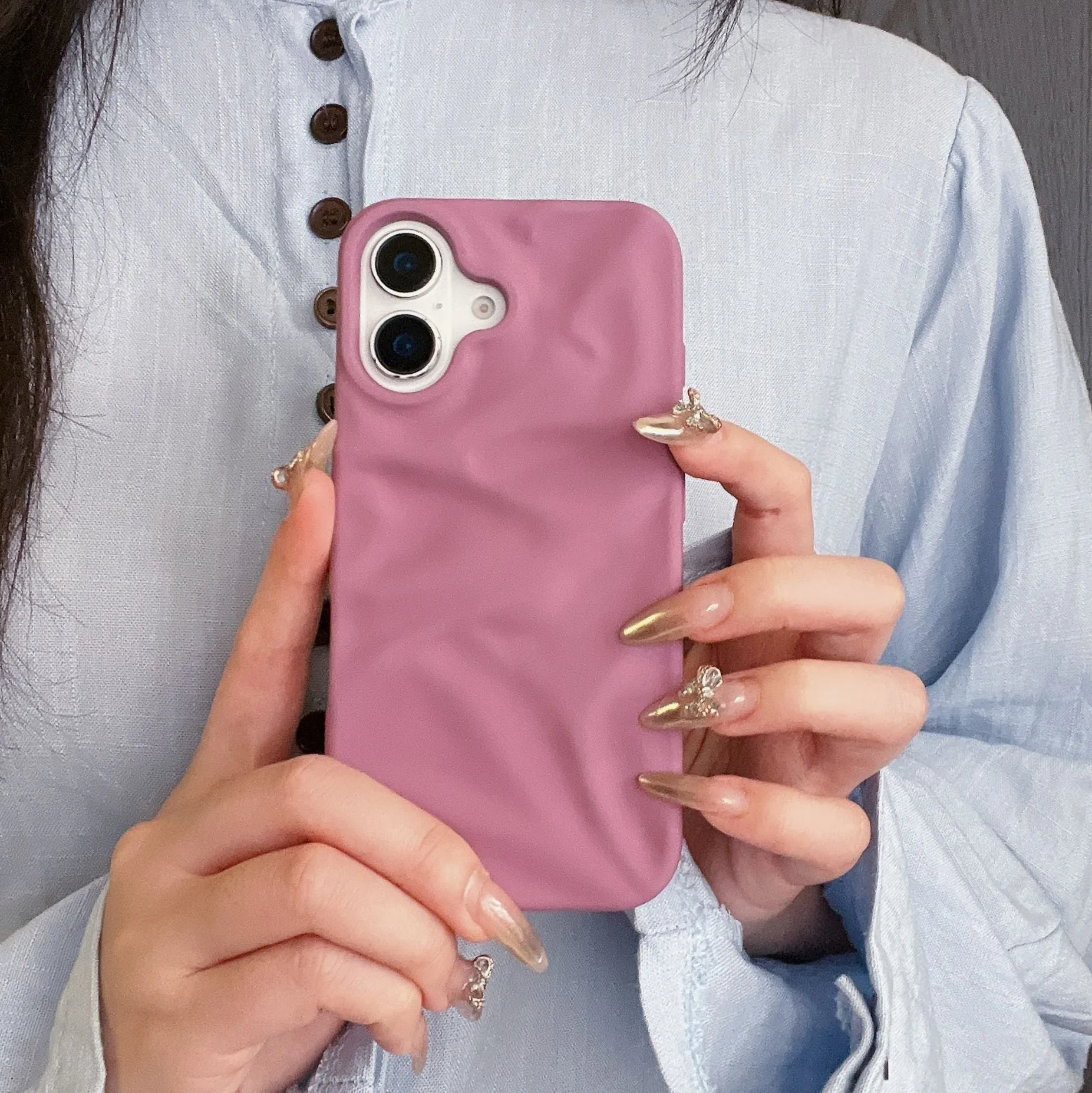 High-grade three-dimensional pleated pattern silicone phone case for iPhone 17 series in black, soft shell construction with fall protection