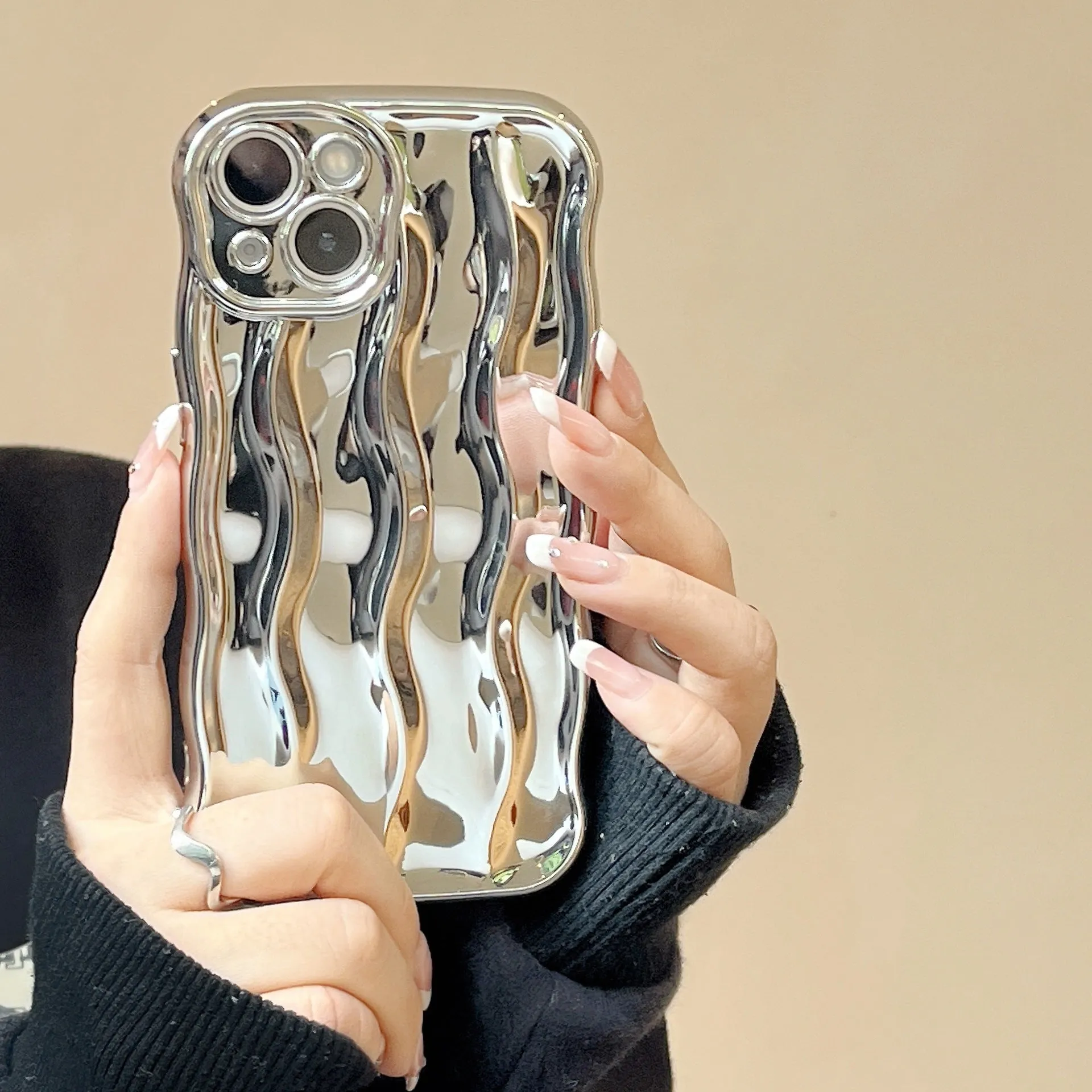 Electroplating three-dimensional wave stripe TPU phone case for iPhone 17 Pro Max in electroplated black finish