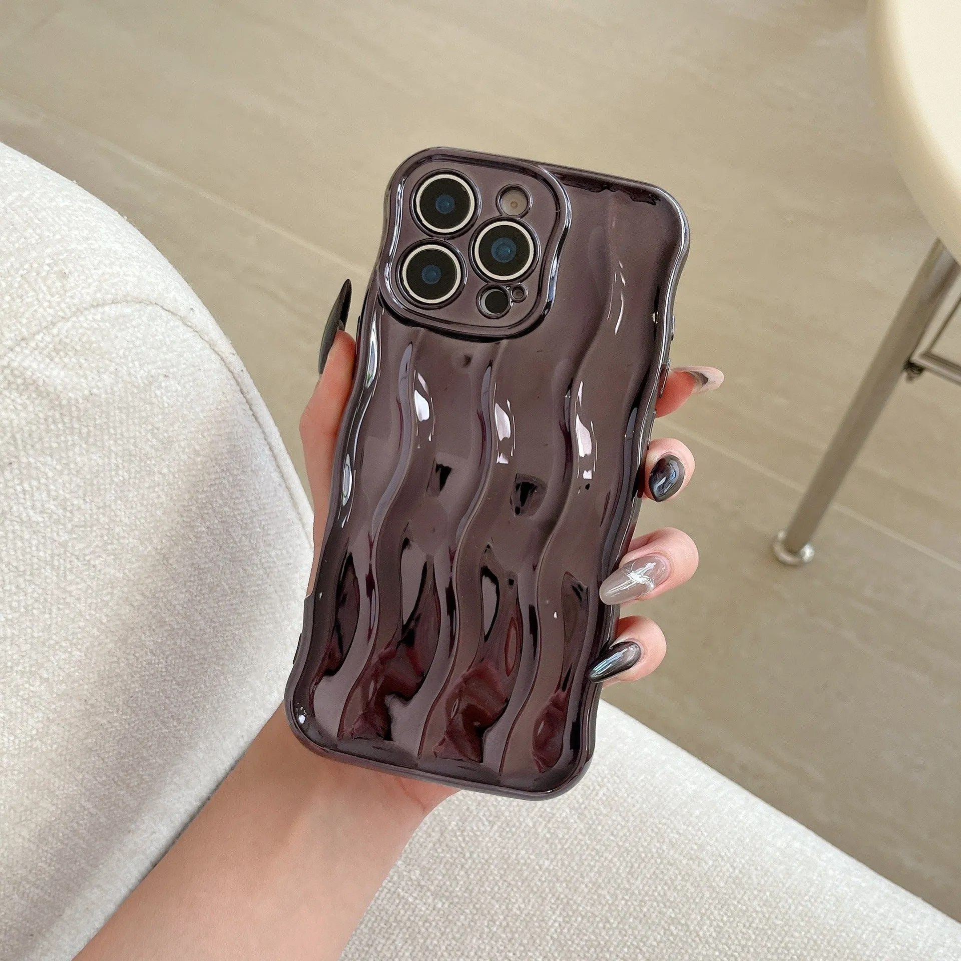 Electroplating three-dimensional wave stripe TPU phone case for iPhone 17 Pro Max in electroplated black finish