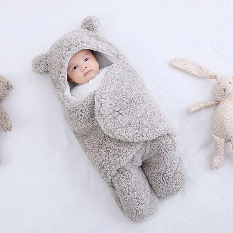 Three-layer newborn sleeping bag envelope in grey with flannel outer and cotton inner, 65cm size
