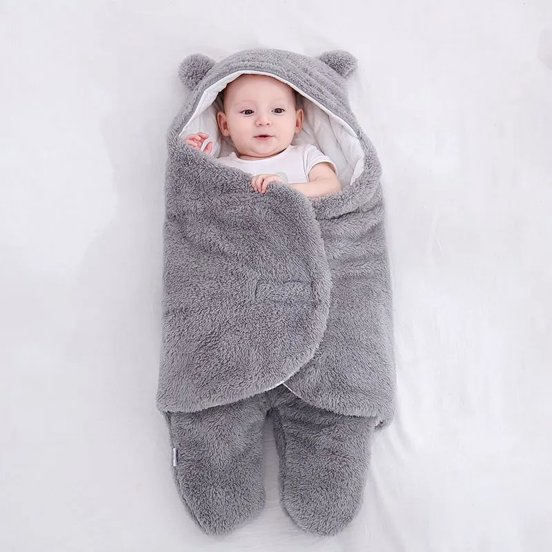Three-layer newborn sleeping bag envelope in grey with flannel outer and cotton inner, 65cm size