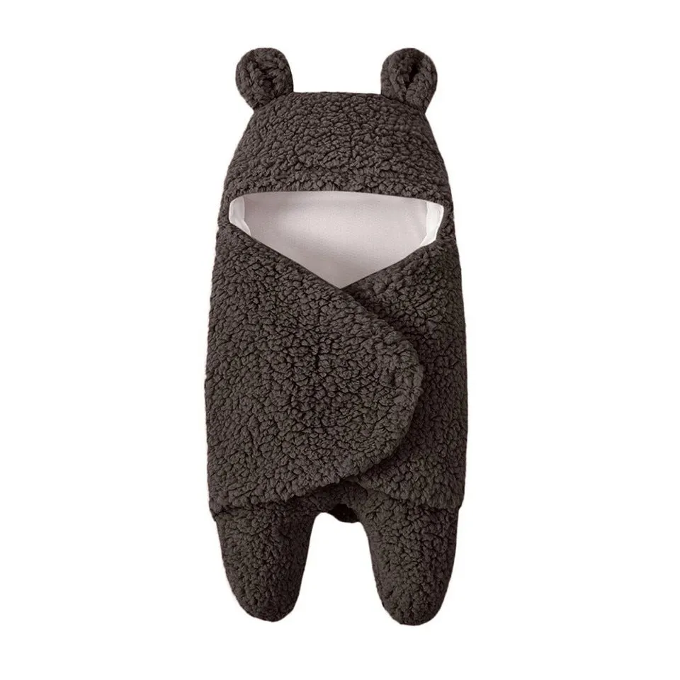 Three-layer newborn sleeping bag envelope in grey with flannel outer and cotton inner, 65cm size