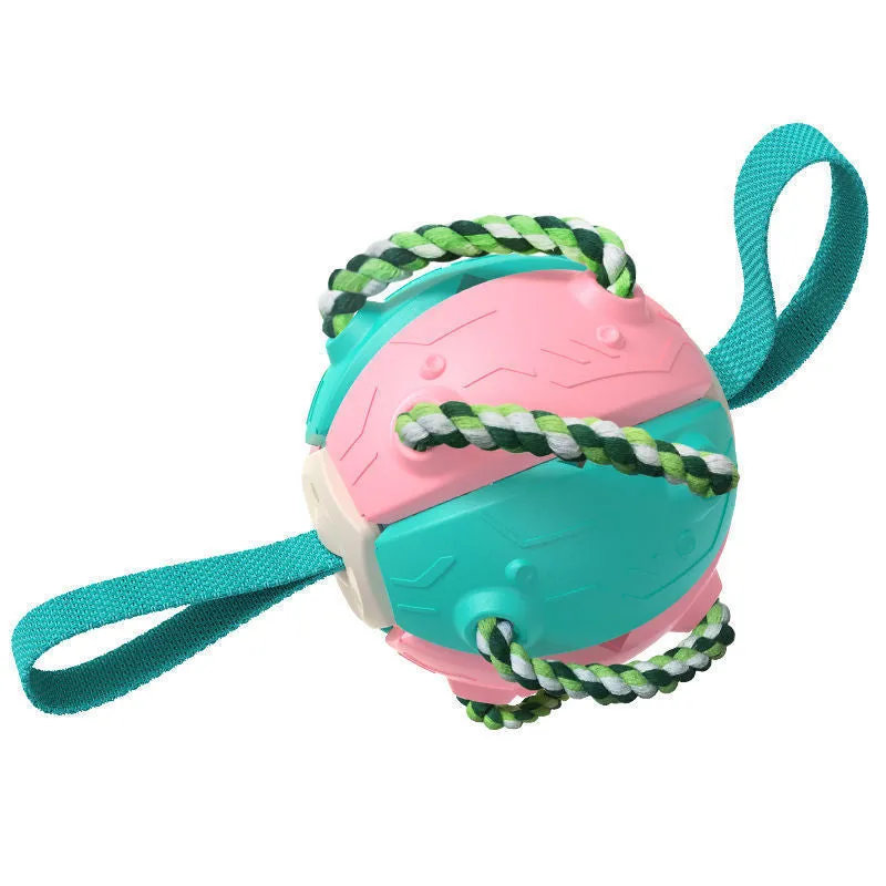 Interactive dog football soccer ball with tabs in blue, showing sphere form with cotton rope and nylon tug rope, on grass