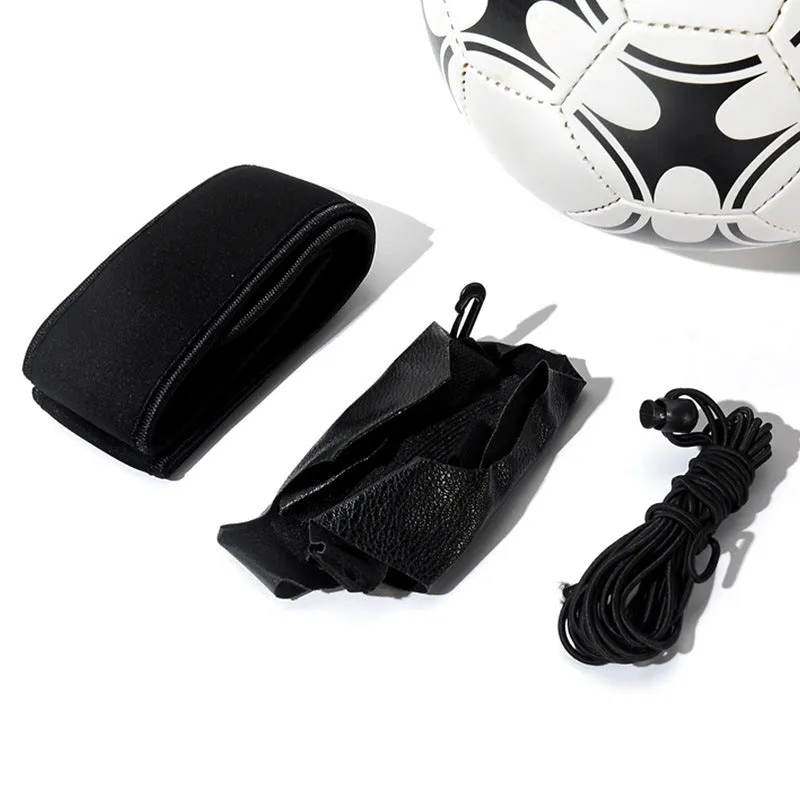 Black soccer training tether with adjustable waist belt and elastic Velcro strap on a green grass field