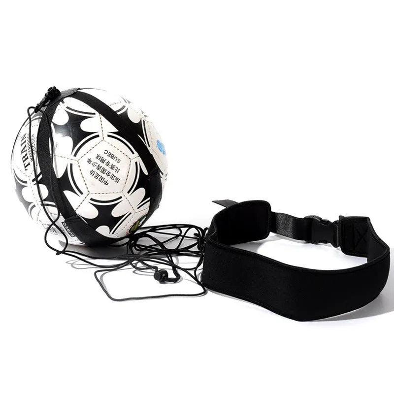 Black soccer training tether with adjustable waist belt and elastic Velcro strap on a green grass field