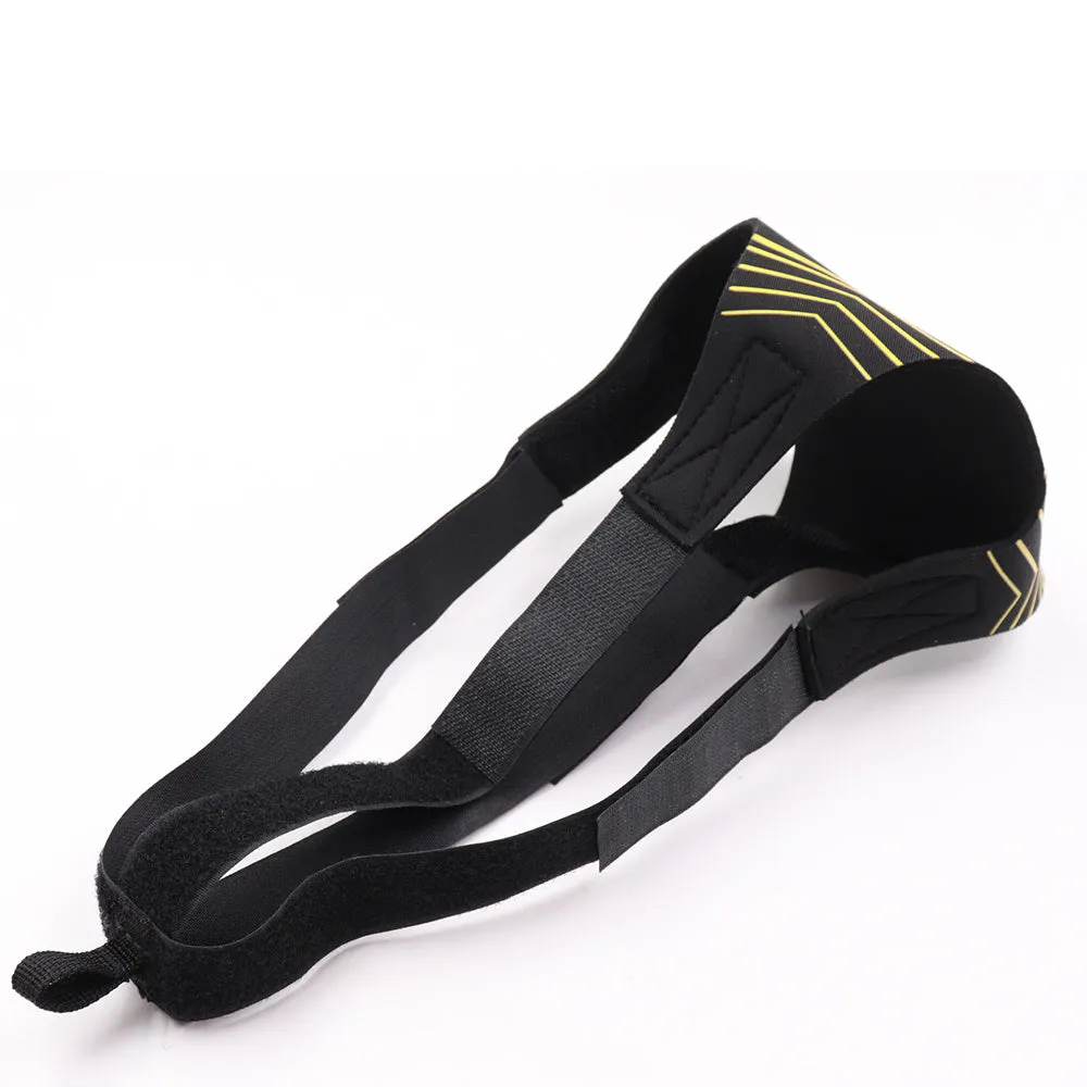 Black soccer training tether with adjustable waist belt and elastic Velcro strap on a green grass field
