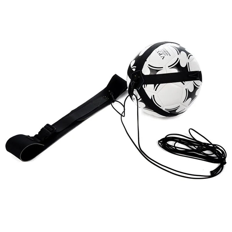 Black soccer training tether with adjustable waist belt and elastic Velcro strap on a green grass field