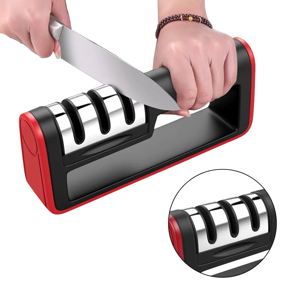 Black and red three-stage knife sharpener with non-skid rubber feet on a worktop